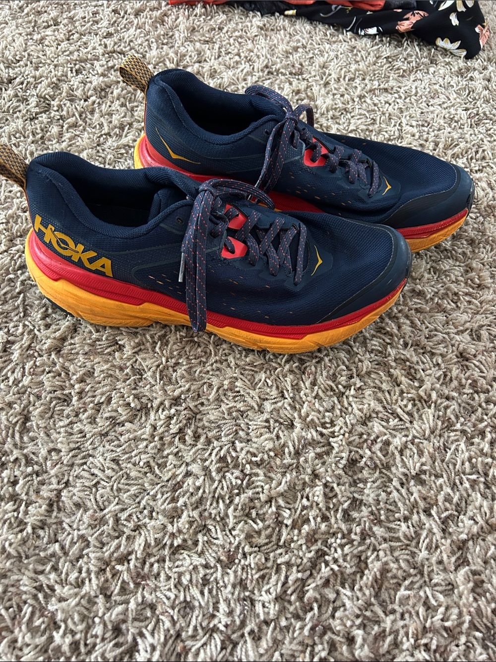 Hoka Navy Running Shoes with Red & Yellow Accents
